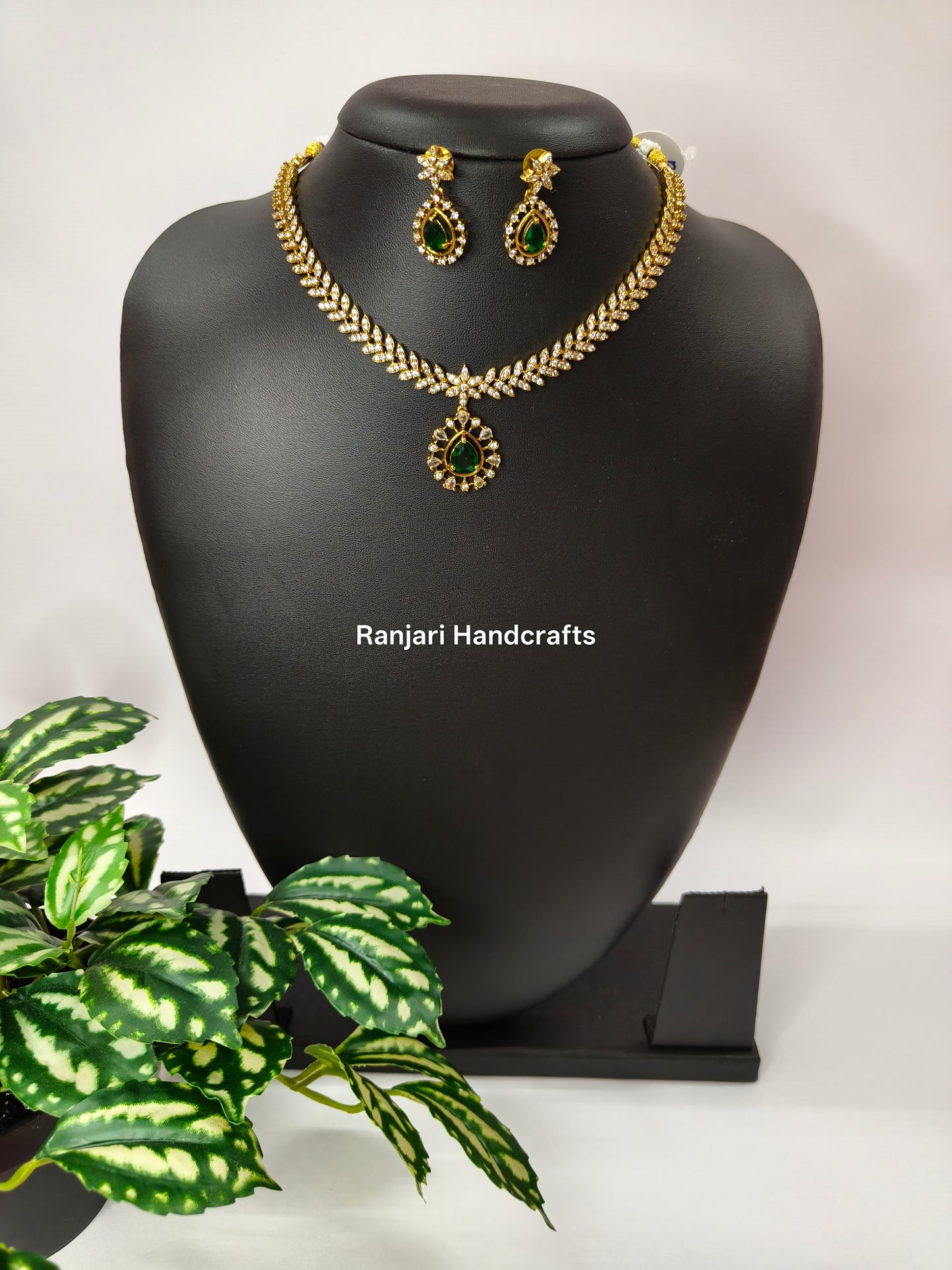 Leafy Diamond Replica with Emerald Pendant Necklace Set