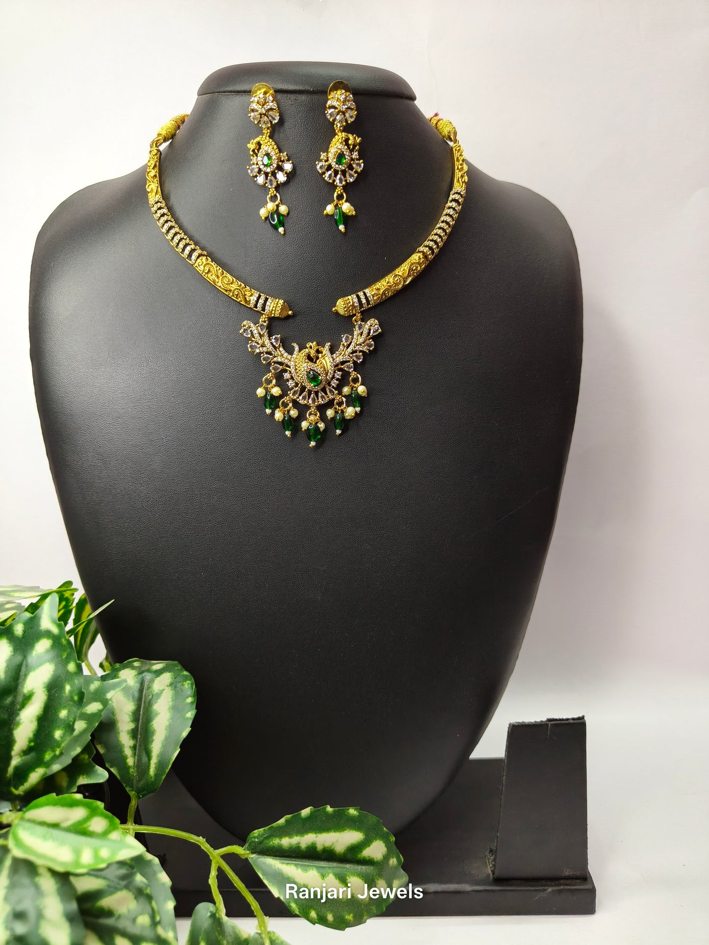 Thaarini – Royal Peacock AD Hasli Necklace Set (Green)