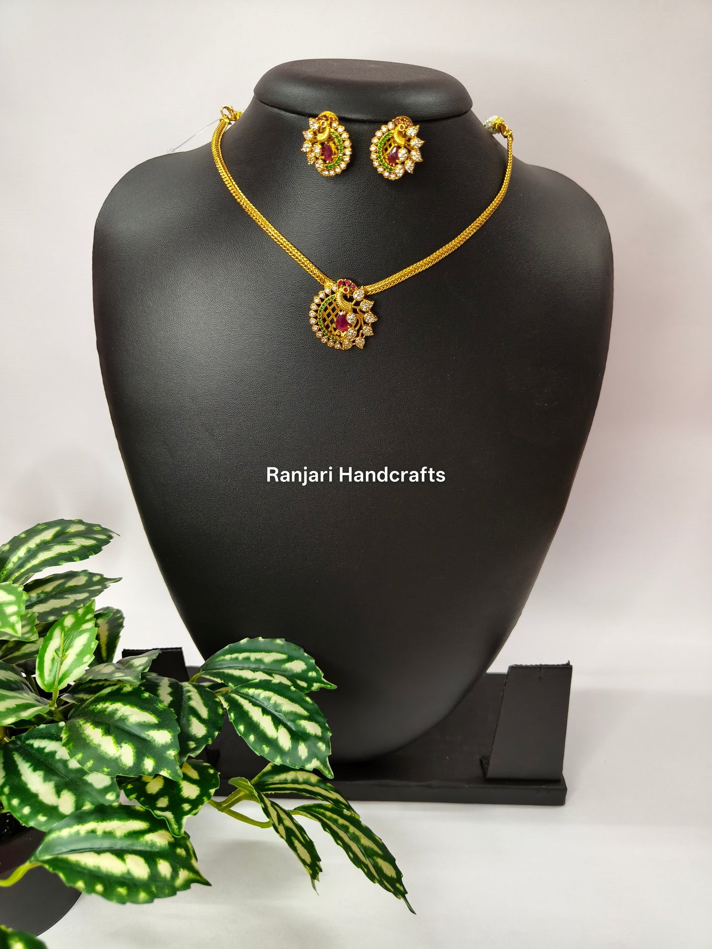 Ruby and Emerald Peacock Attigai