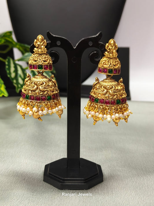 Shivani – Lakshmi Double Dome Kemp Jhumka Earrings with Pearl Hangings