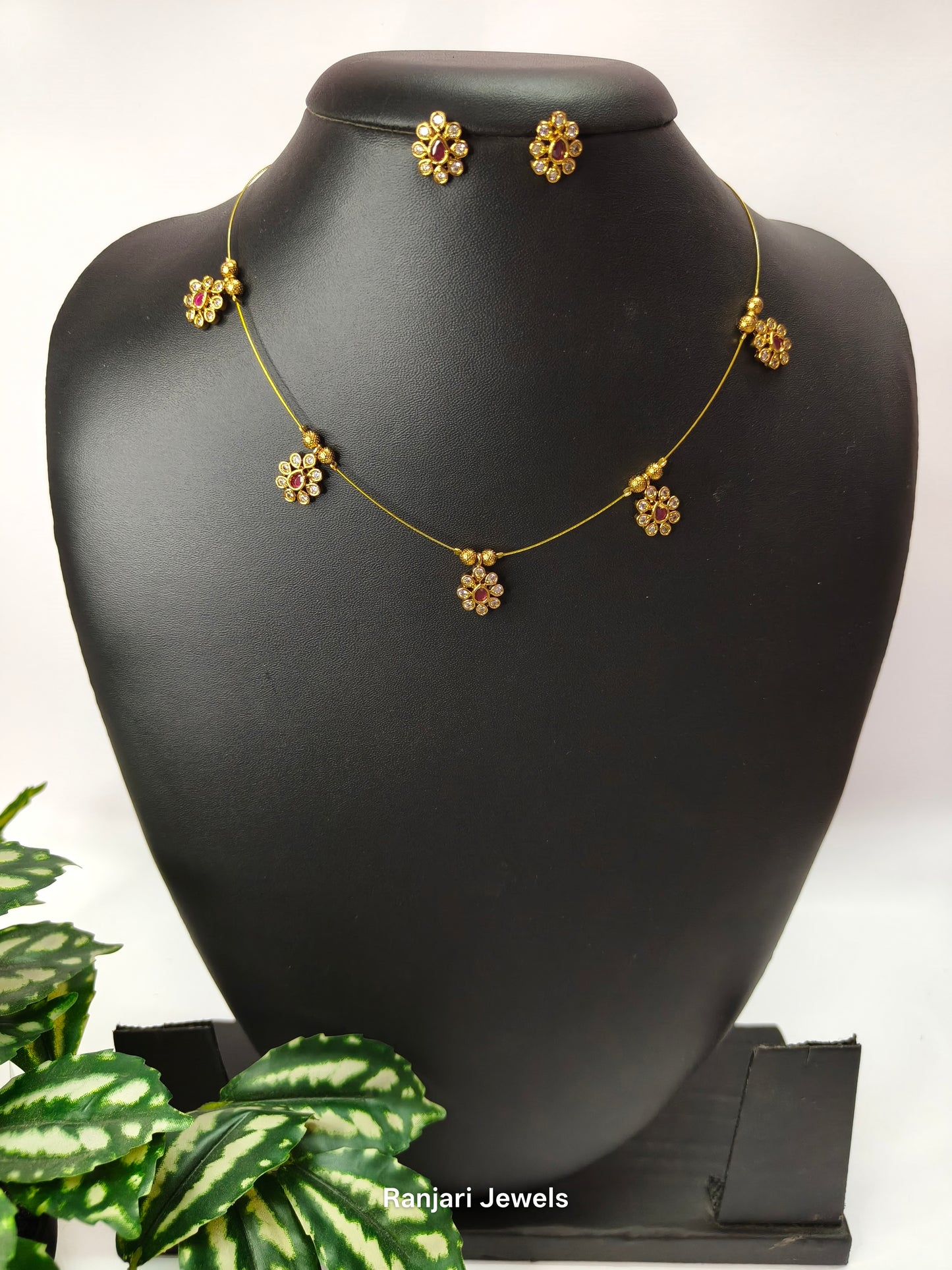 Kumudini – Floral AD Stone Invisible Chain Set