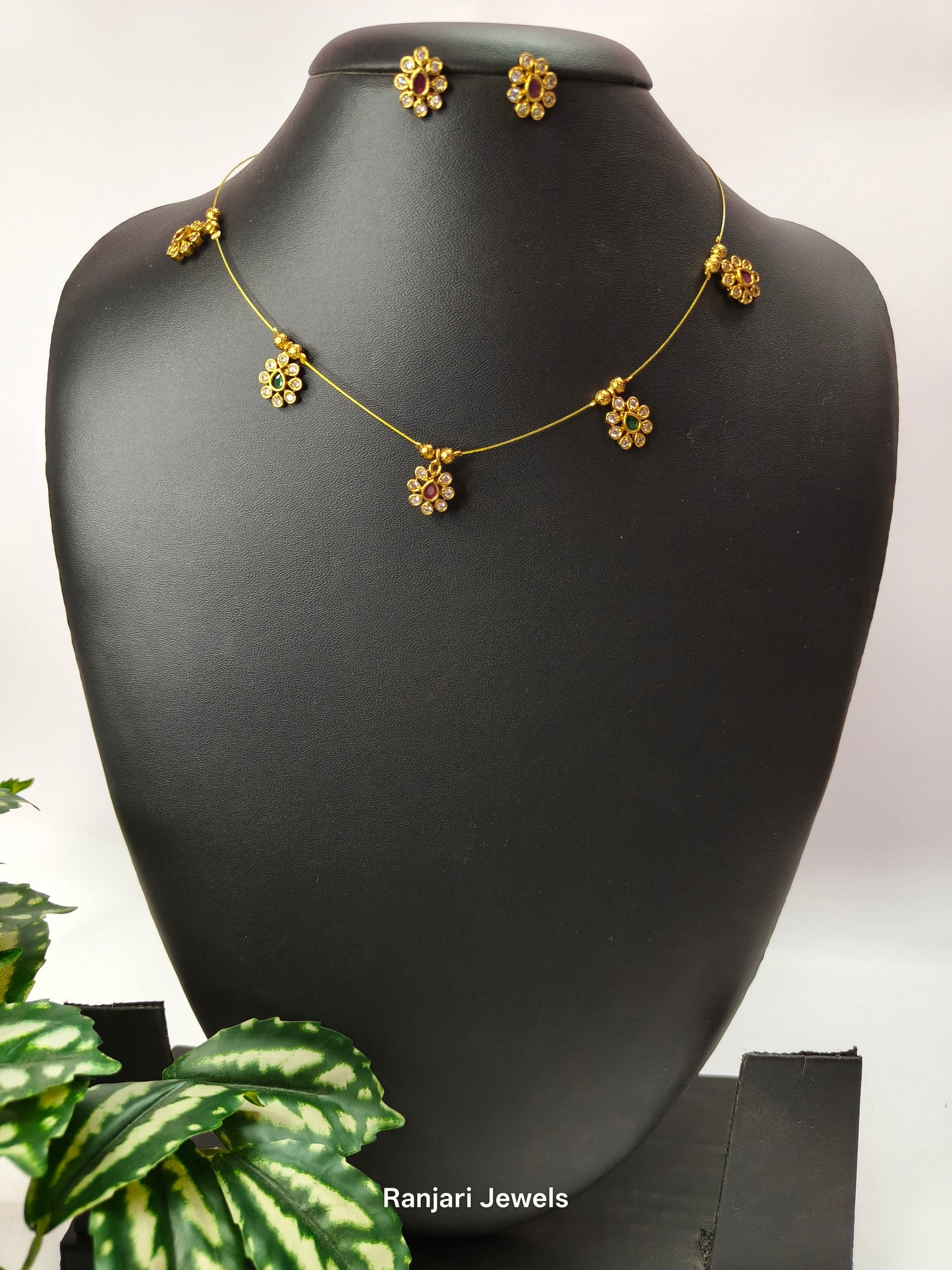 Kumudini – Floral AD Stone Invisible Chain Set