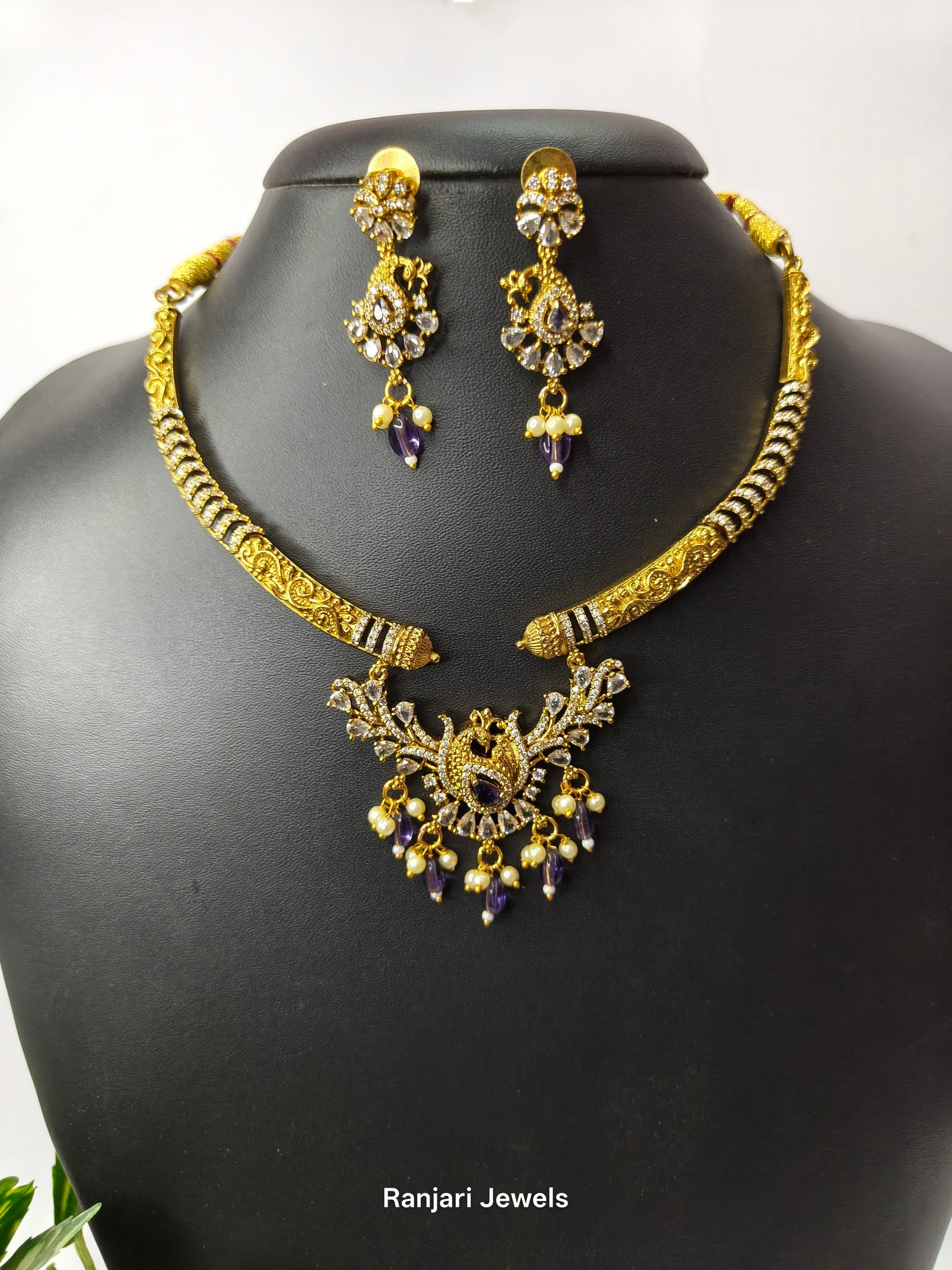 Thaarini – Royal Peacock AD Hasli Necklace Set (Purple)