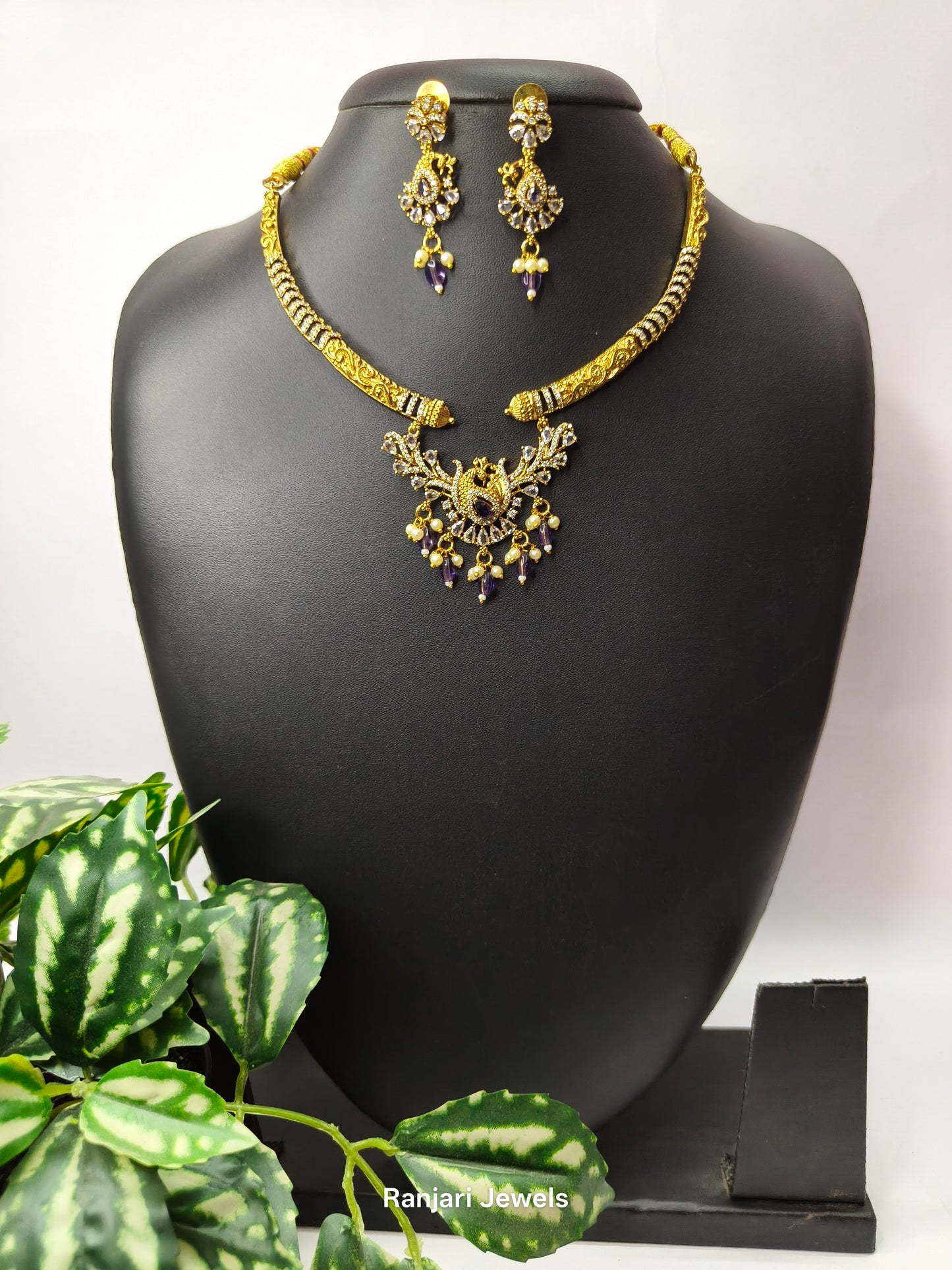 Thaarini – Royal Peacock AD Hasli Necklace Set (Purple)