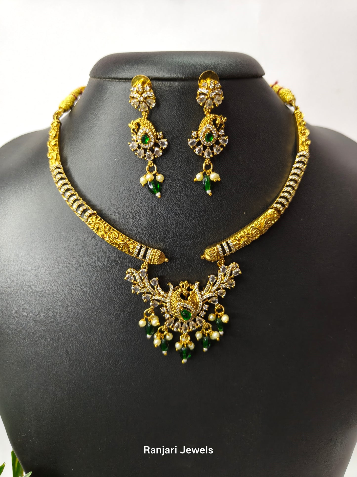 Thaarini – Royal Peacock AD Hasli Necklace Set (Green)