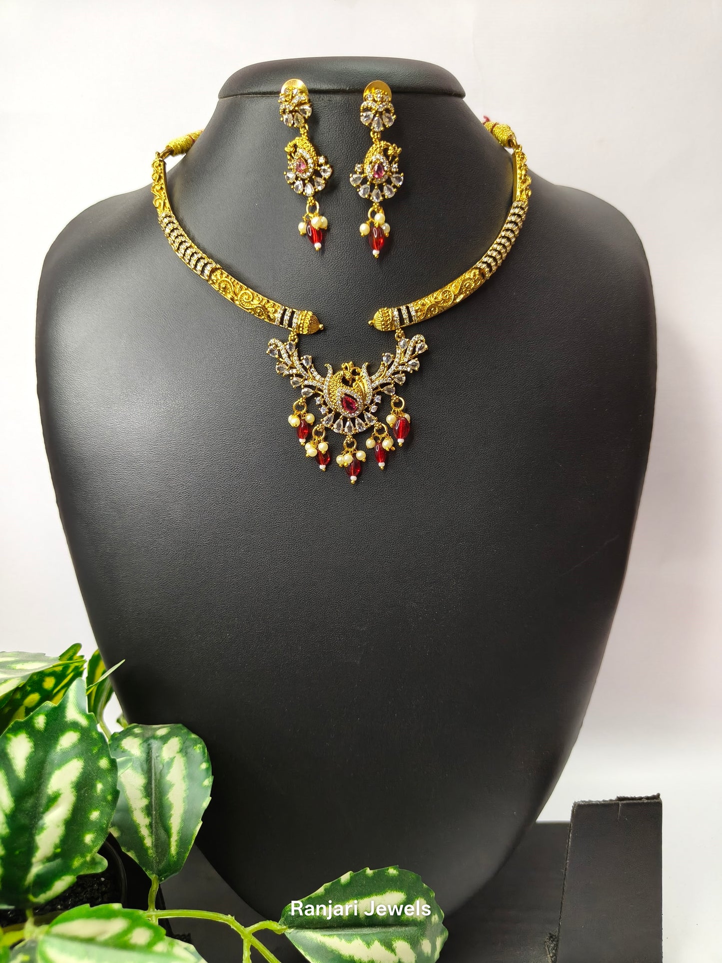 Thaarini – Royal Peacock AD Hasli Necklace Set (Red)
