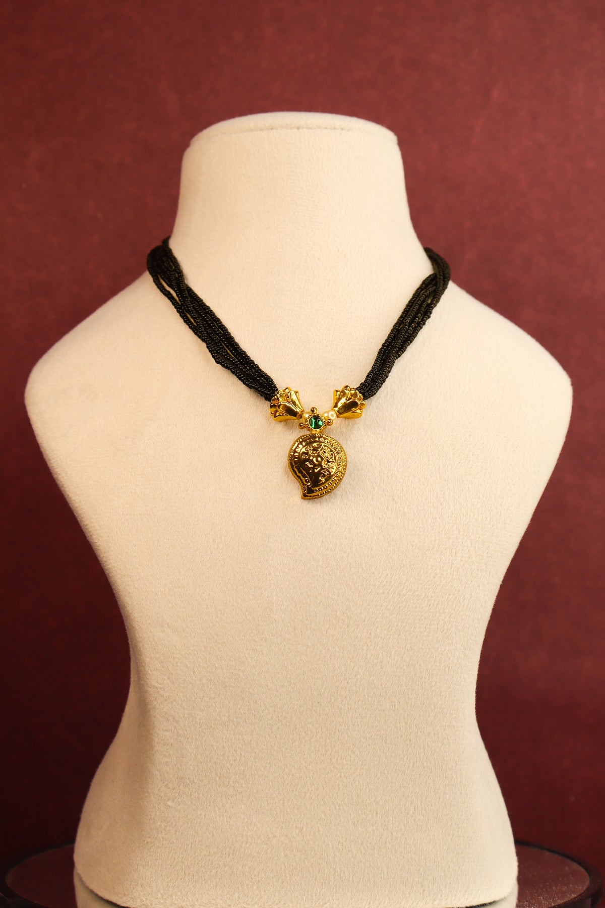 Multi line Black Beads Chain with Mango Pendant